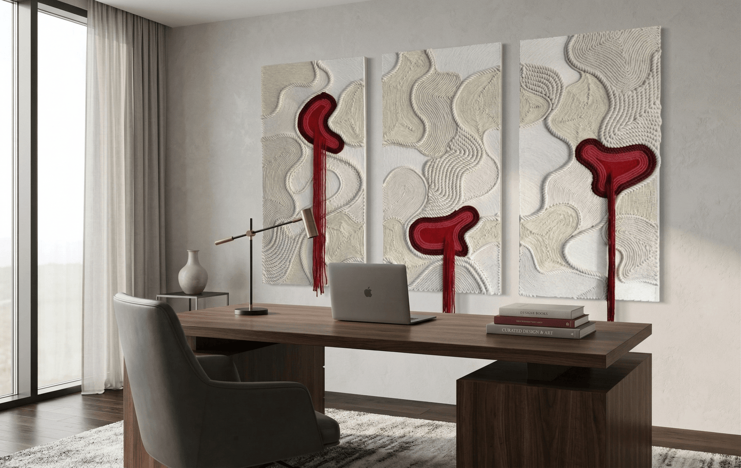 Modern office interior with a desk, chair, and abstract wall art.